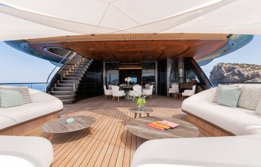 Overview of an aft deck onboard charter yacht KENSHO, with sprinkled seating