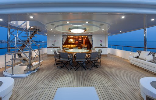 alfresco dining on the aft upper deck of luxury yacht PRIDE