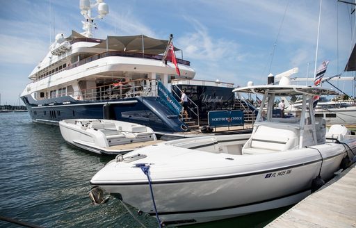 A motor yacht charter and tender berthed at the Newport Charter Yacht Show