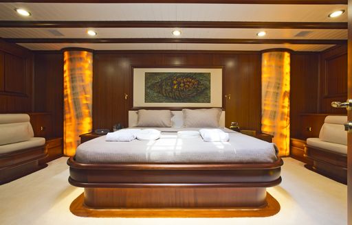 forward master cabin with onyx columns on board luxury yacht REGINA