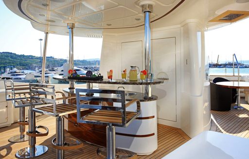 Sun deck bar and jacuzzi on board charter yacht BEHIKE