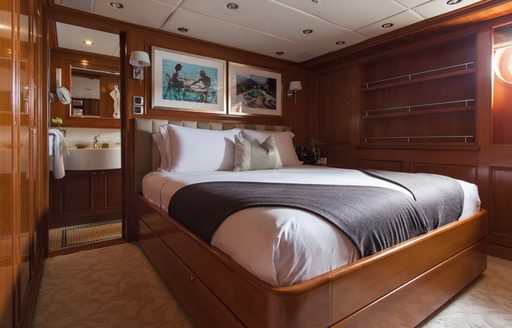 traditionally styled master suite on board expedition yacht RELENTLESS 
