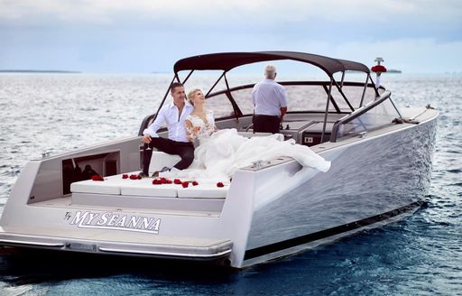 married couple on wedding day in superyacht 'My Seanna' tender
