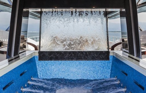 Waterfall feature in motion onboard charter yacht PARILLION