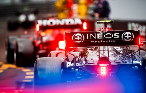 Close up view of lights on Formula One racing cars in action