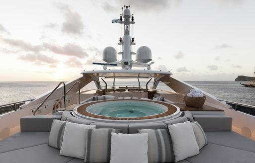 Spa pool and sun pads on sun deck of charter yacht LAURENTIA