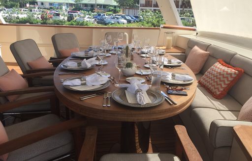 Main aft deck set up for brokers lunch on board charter yacht Zeepaard