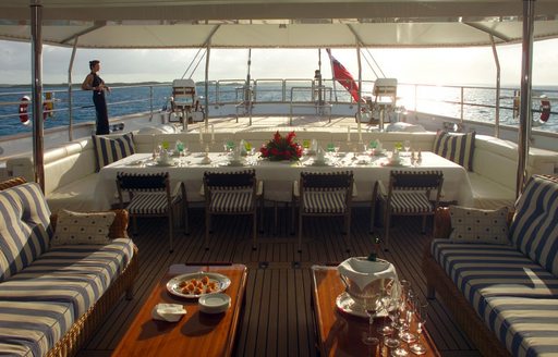 Charter guests relaxing on Spirit of the C's aft deck 