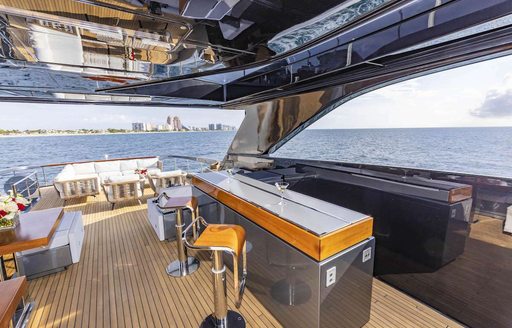 expansive deck space and bar area onboard Tasty Waves