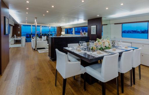 formal dining area in the main salon aboard superyacht LIONSHARE