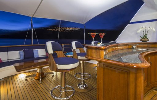 cocktails served at wet bar on sundeck of luxury yacht TELEOST