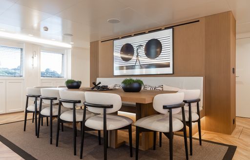 Interior dinng area onboard charter yacht ILLUSION II