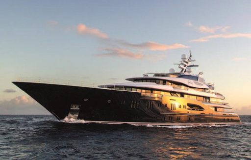 luxury yacht SOLANDGE cruising on charter at twilight