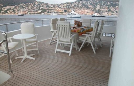 Alfresco seating area on board charter yacht Island Heiress