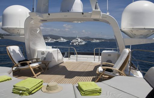 sun pads and loungers on the sundeck of luxury yacht SALU