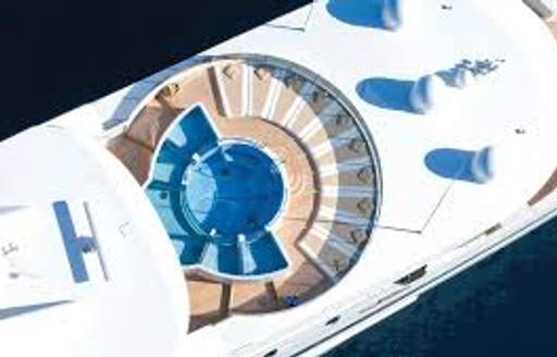 Aerial view of round Jacuzzi pool on superyacht Natita