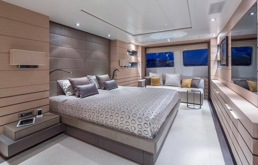master suite with light oak wall panels on board luxury yacht DYNAR 