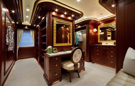 Overview of the walk-in wardrobe in the master cabin onboard private charter yacht GIGIA