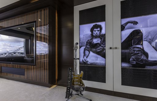 Keith Richards doors and guitar in skylounge of motor yacht King Baby 