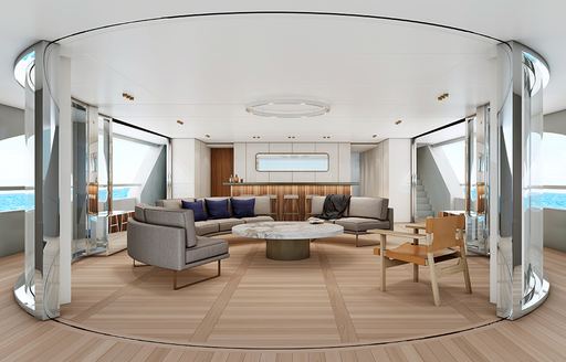 Light and airy interiors and C shaped sofa on superyacht REBECA