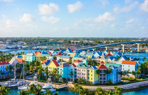 Coloured buildings in Nassau, Bahamas lined up along waterways