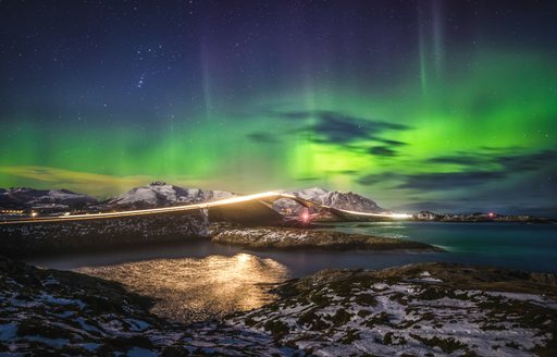 northern lights above the ocean 