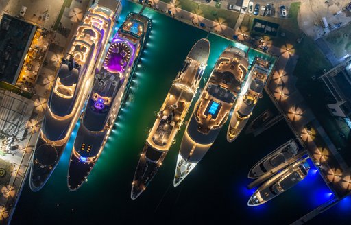 Superyachts lined up in Jeddah Marina ahead of the Saudi Arabia Grand Prix at night