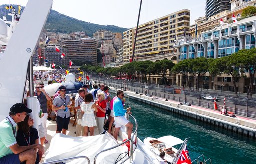 Race-goers on a yacht celebrating at the Monaco Grand Prix