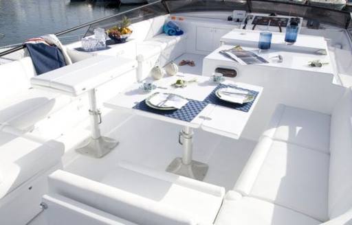 the airy and bright flyrbridge of motor yacht WISH overlooking the mediterranean