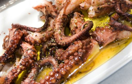 Octobus tentacles being prepared to eat
