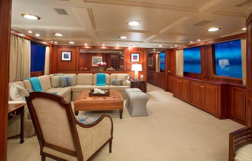 L-shaped sofa in main salon of charter yacht ‘Lady J’ 