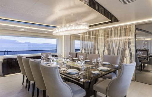 formal dining area in main salon of charter yacht ‘Polaris I’ 