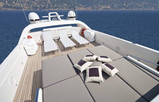 Sundeck of motor yacht TOBY, with sunpads and sunloungers