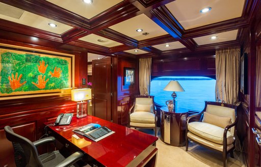 office area with desk forming part of the master suite on board motor yacht Lady Joy 