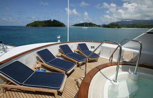 sun loungers line up on sundeck of charter yacht TELEOST
