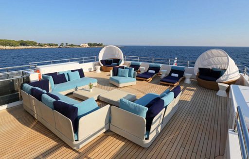 seating and loungers on the sundeck of charter yacht ELENI 