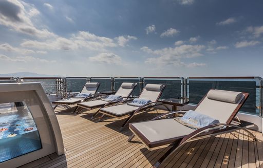 chaise loungers line up on sundeck aft of luxury yacht ‘Polaris I’ 