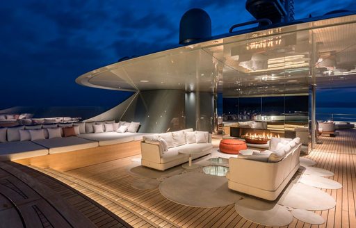 alfresco lounge with fireplace aboard motor yacht SAVANNAH 