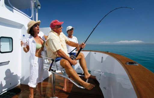 charter guests enjoy game fishing on board luxury yacht ‘Emerald Lady’