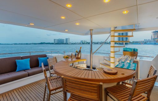 teak-clad bar on the main deck aft of luxury yacht LIONSHARE