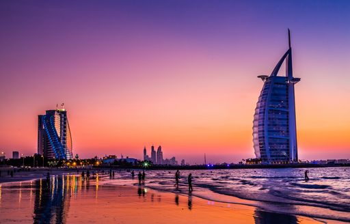 Sunset Beach with Burj Al Arab in the distance in Dubai, United Arab Emirates
