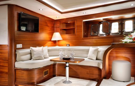 Private seating area in the master cabin onboard sailing yacht charter ALESSANDRO I