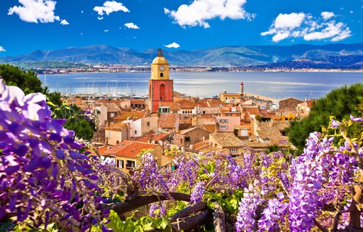 The beautiful village of St Tropez with sea and hills in the background