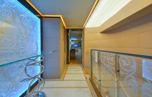 beautiful hallway of motor yacht ‘Ghost II’ with glass features
