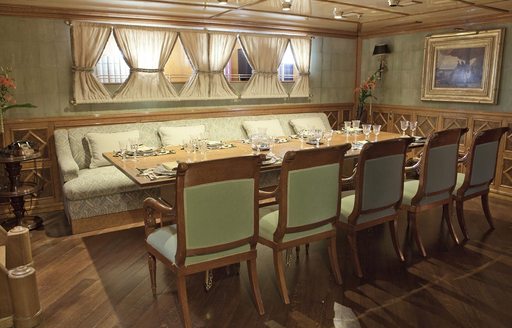 John Munford-designed table in dining salon aboard luxury yacht CREOLE 