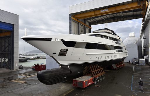 luxury yacht KD is transported from the shipyard to the water for her launch