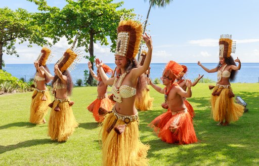 Dancers perform their traditional ceremonial welcome in Tahiti, French Polynesia