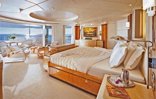 Main salon and balcony on luxury charter yacht SYCARA V