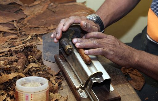 Hand rolling cigars in Cuba