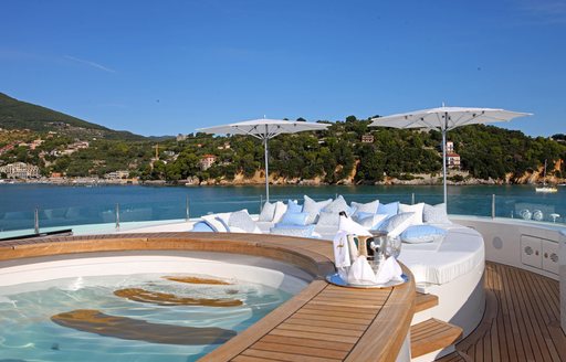 jacuzzi and sun pads on sun deck of luxury charter yacht st david